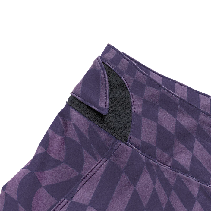 Close-up of a purple checkered fabric with a black interior lining on a white background