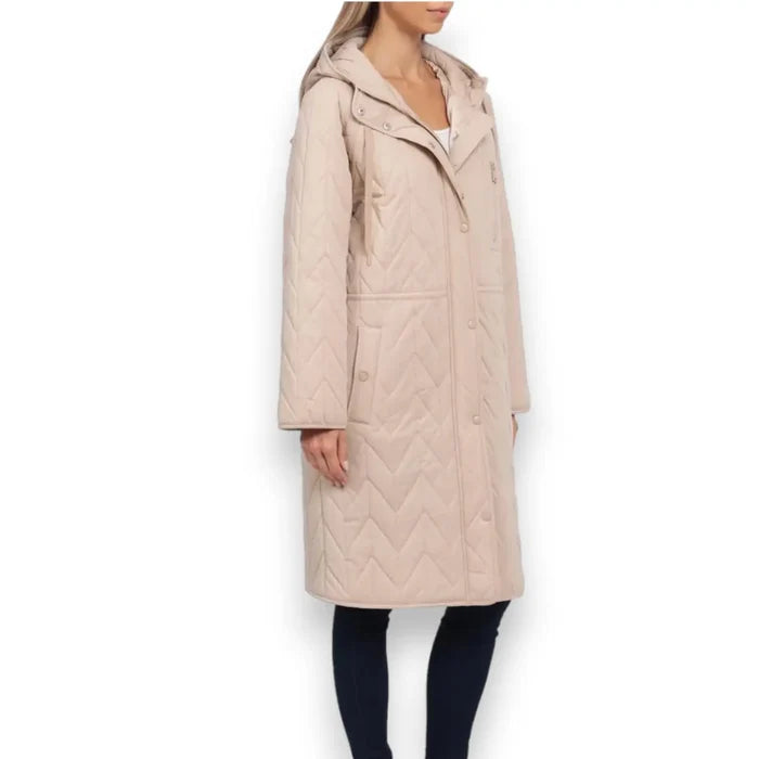 woman wearing side view zip front with snap panel pocket, front panel, long sleeve, tan winter hooded puffer coat