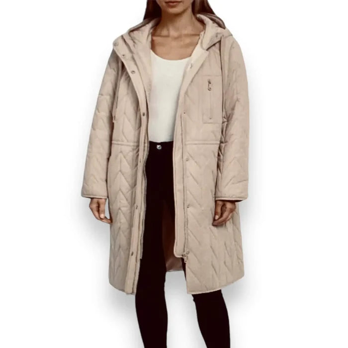 woman wearing open front tan long puffer coat with oversized drawstring hood and snap placket, front view