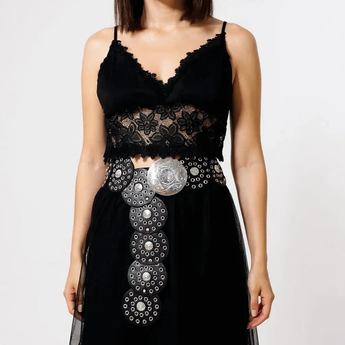 Women's wide leather disc statement belt with overlapping medallions, studs and engraved metal centerpiece