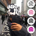 Unisex knit beanie with bold “Mea Culpa” graphic in black and white, styled as winter streetwear hat for Y2K fashion.