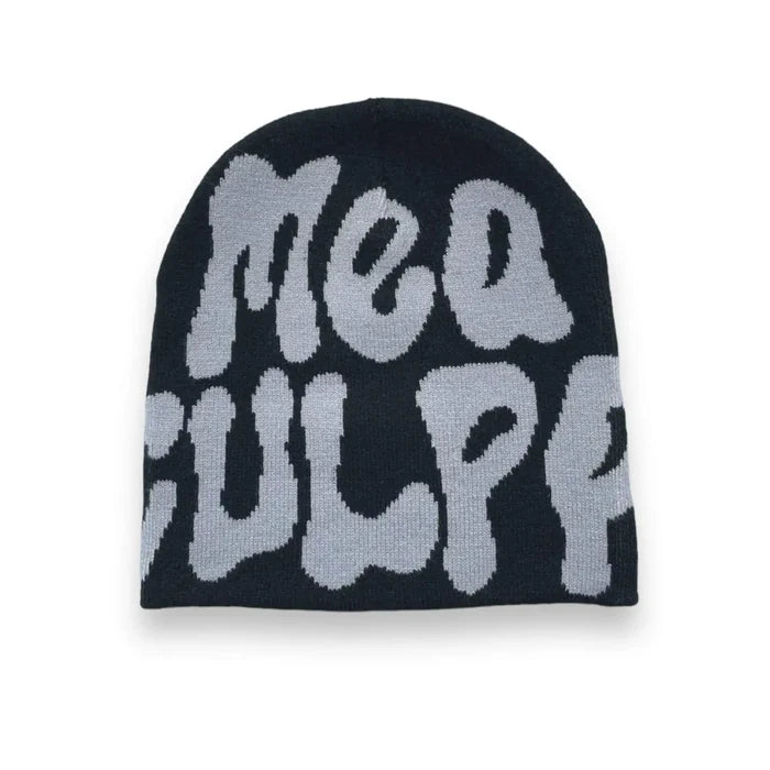 Unisex knit beanie with bold “Mea Culpa” graphic in black and white, styled as winter streetwear hat for Y2K fashion.