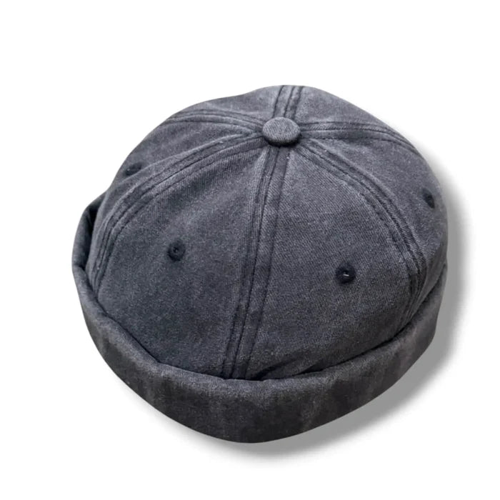 Zero-brim denim docker cap rolled cuff, stitched eyelets and adjustable back strap streetwear black